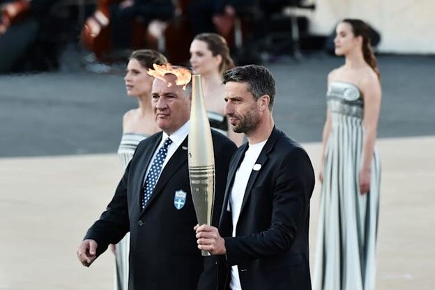 sd2 - Asia: Olympic flame handover ceremony marks transition from Greece to Paris 2024 - Exactly three months before the Olympic Games begin, the Olympic flame has been handed over, transitioning from its Greek origins to the French stage, signifying the next chapter in its journey towards Paris. The ceremony, hosted by the Hellenic Olympic Committee, unfolded in Athens’ iconic Panathenaic Stadium, which hosted the first Olympic Games of the modern era in 1896, embodying a message of peace and unity.